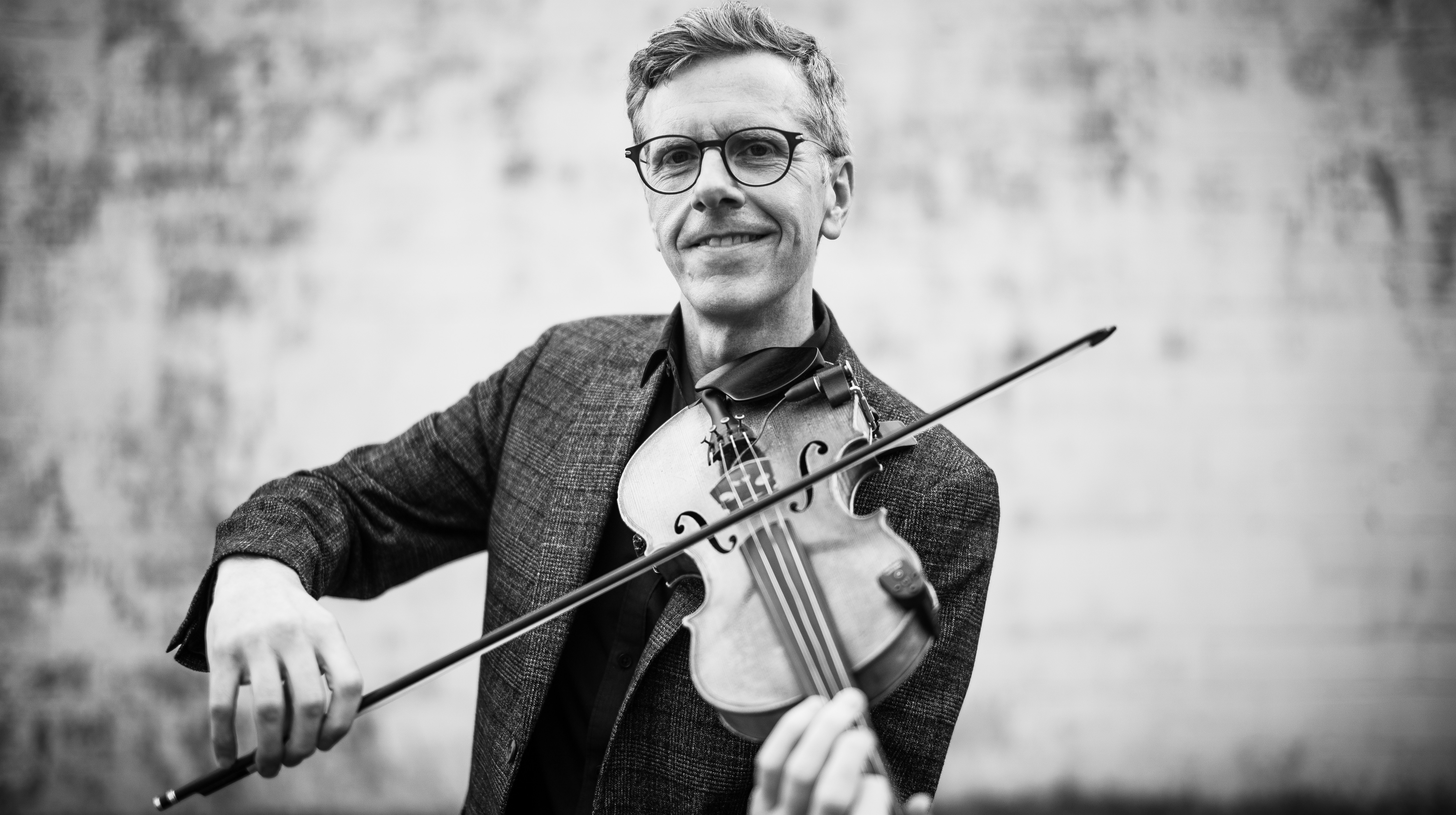 Eamon McLoughlin - Grammy Nominated British Born Fiddle Player. Member Of The Grand Ole Opry Band. Specializes In Country, Bluegrass And Americana Music. Tours With EmmyLou Harris And Rodney Crowell. Backed Vince Gill, Nina Simone, Oak Ridge Boys!